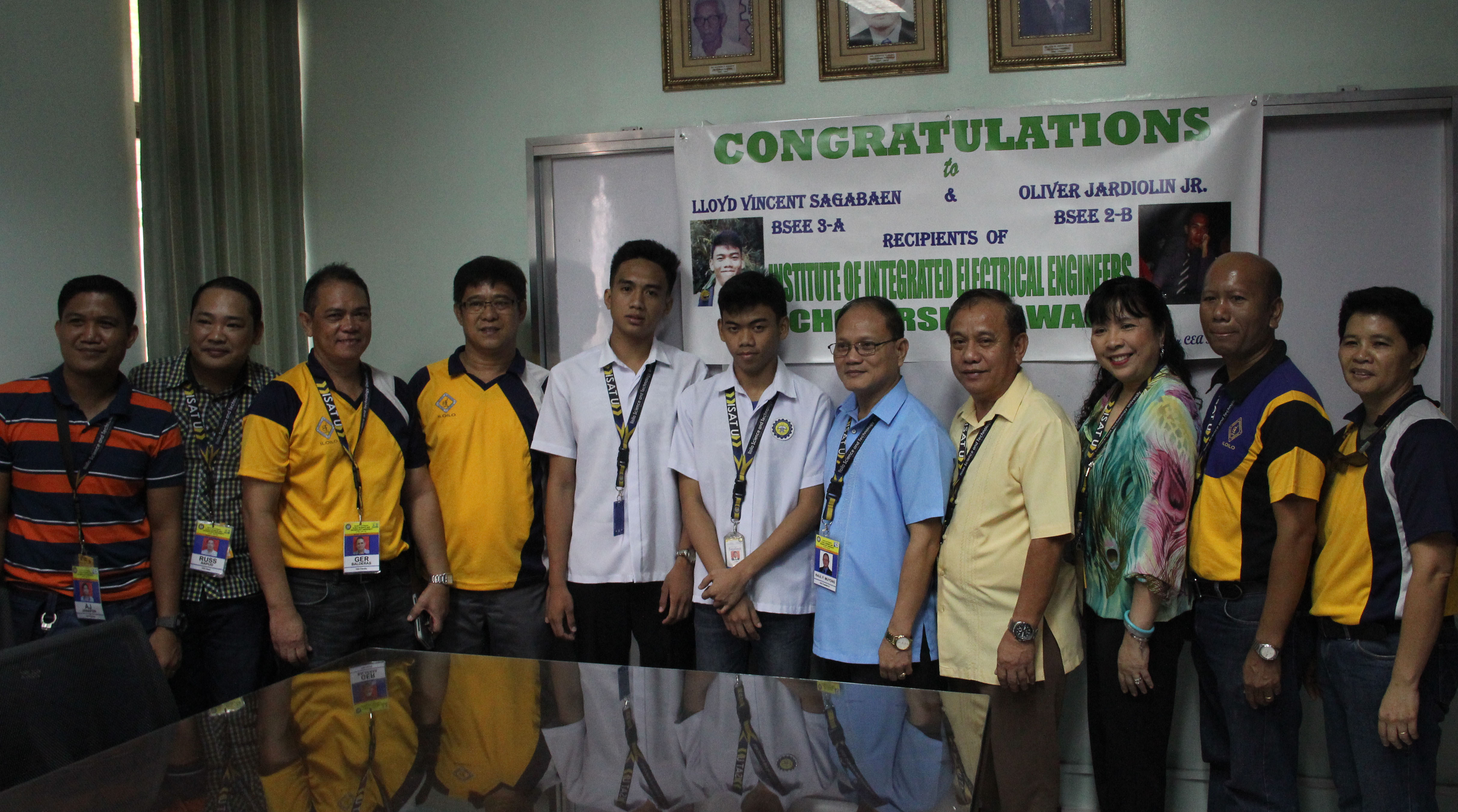 The awardees with the top university officers and Integrated Institute of Electrical Engineers (IIEE) Iloilo Chapter members.