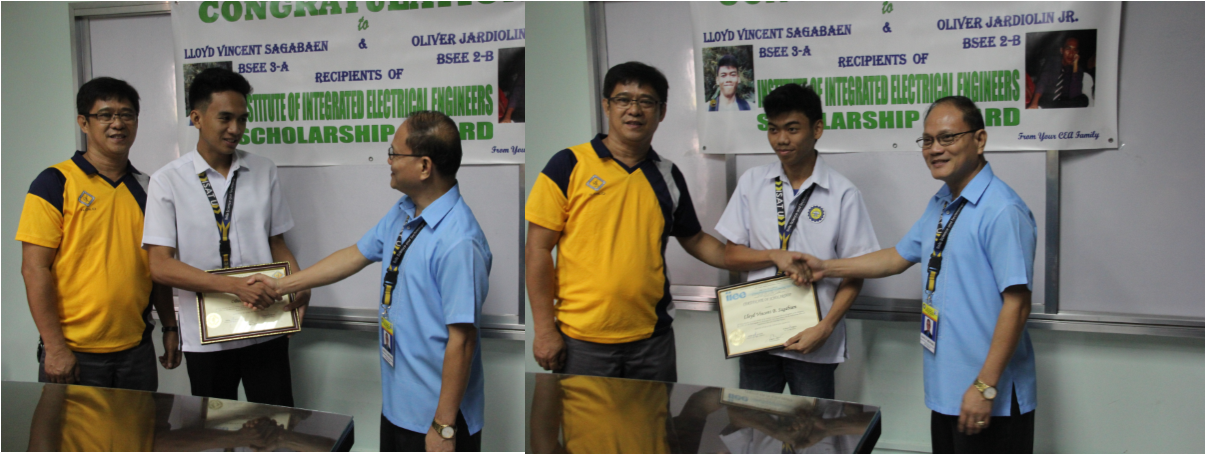 University Pres. Dr. Raul F. Muyong  congratulates Oliver Jardiolin (left) and Sagaba-en. Looking on is Engr. Arnold Suganob, IIEE- Iloilo President