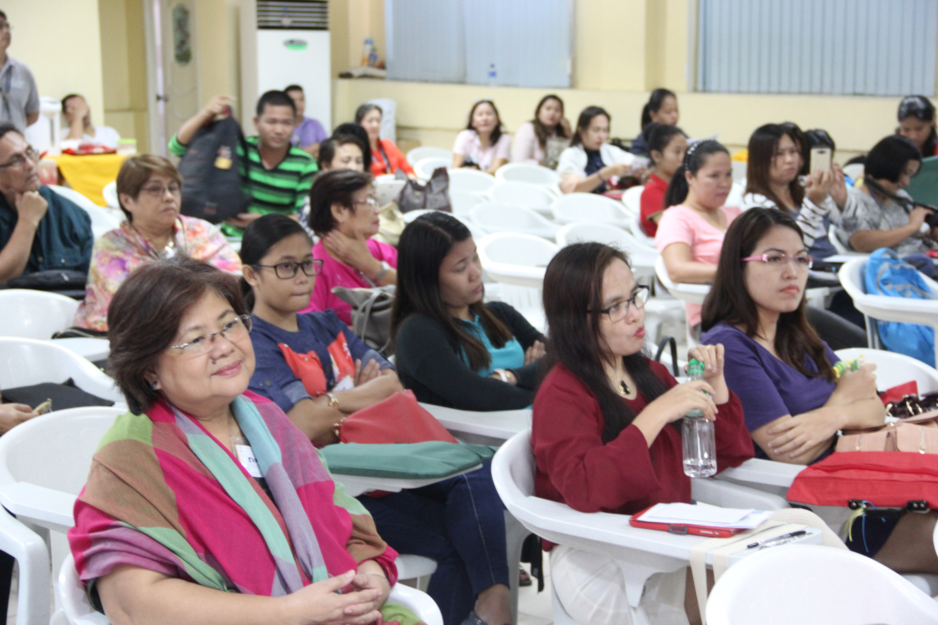 The participants listen intently on the lectures and discussions.