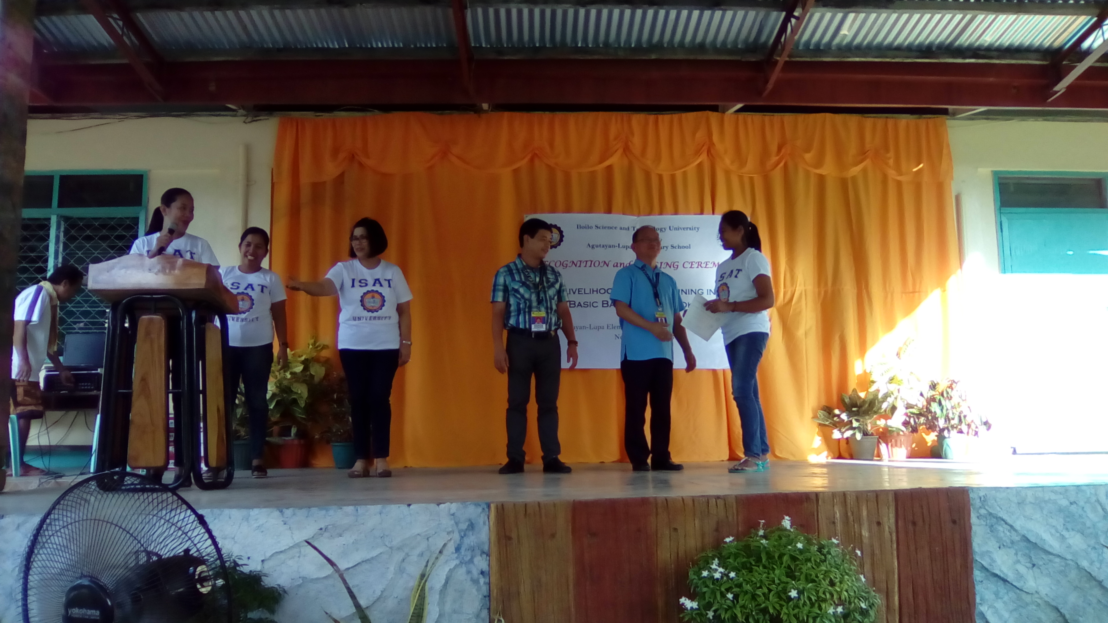 The participants receive the certificate during the culminating activity at Agutayan-Lupa Elementary School after completing the 10-day skills training.