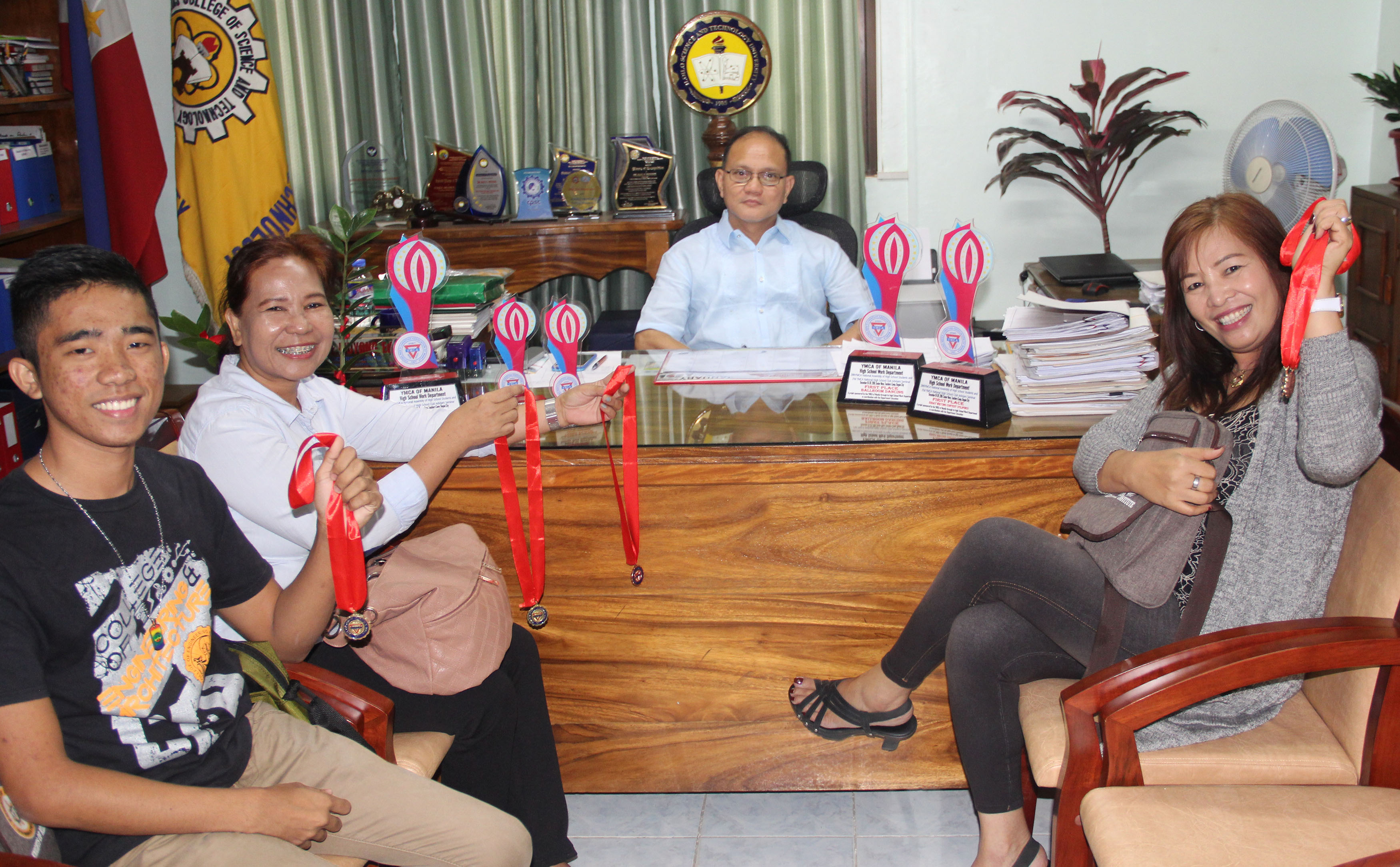 Student Republic President John A. Janolino, Dr. Giorgina D. Dimavibas, OIC Principal, Lab School and Prof. Gina P Haresco, Balaan Dance Troupe Adiser during a courtesy call at the President's Office.