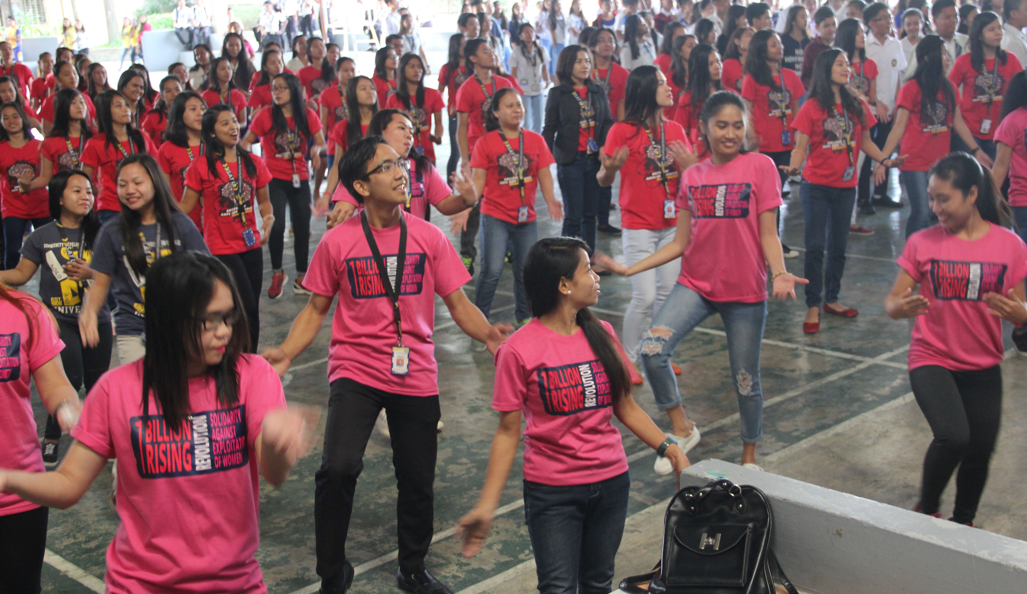 Dancing to the tune of "Isang Bilyon", the students join in 1 Billion Rising Revolution solidarity against exploitation of women.