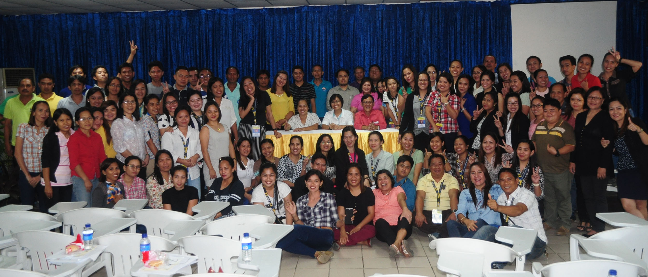 the participants pose for the camera after completing the two-day seminar workshop.